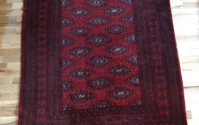 SOLD. A Pakistani rug in classical Bochara design. 20/21st century. 185 x 130 cm. –...