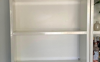 A Polyurethane Four Shelf over Two Door Cabinet