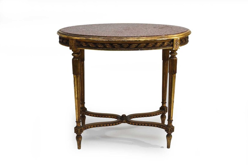 A Regency style giltwood marble-topped oval occasional table