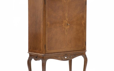 SOLD. A Rococo style walnut bar cabinet. Mid 20th century. H. 154 cm. W. 90 cm. D. 44 cm. – Bruun Rasmussen Auctioneers of Fine Art