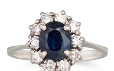 A SAPPHIRE AND DIAMOND CLUSTER DRESS RING, mounted in 18ct w...