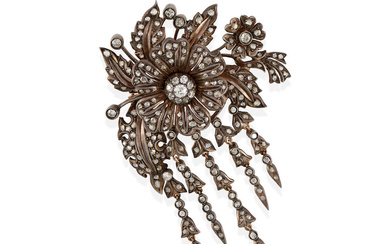 A SILVER-TOPPED 14K GOLD AND DIAMOND BROOCH