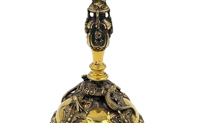A STUNNING SILVER GILT TABLE BELL WITH INTRICATE EMBOSSED...