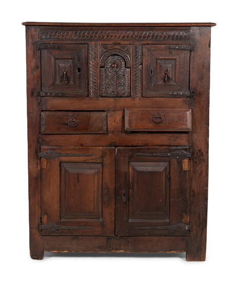 A Spanish Carved Walnut Cabinet