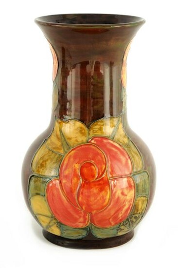 A WILLIAM MOORCROFT BULBOUS VASE WITH FLARED CYLIN