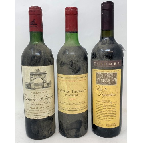 A bottle of Grand Vin de Leoville, 1985, a bottle of Chateau...