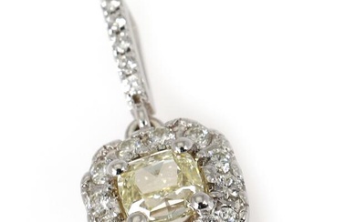 A diamond pendant set with a cushion modified brilliant-cut yellow diamond weighing...