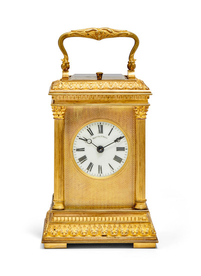 A gilt repeating carriage clock