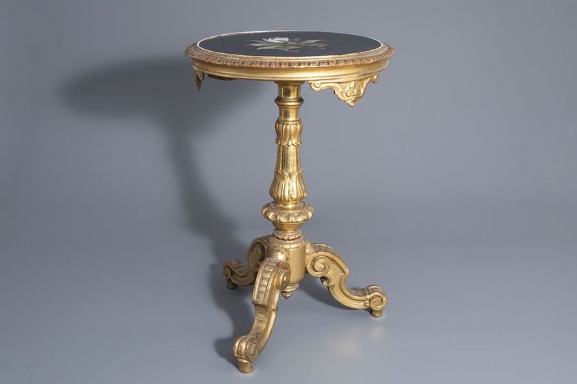 A gilt wood tripod side table with pietra...