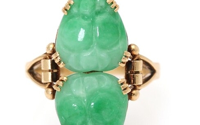 SOLD. A jade ring set with two carved jade, mounted in 14k gold. Size 52. – Bruun Rasmussen Auctioneers of Fine Art