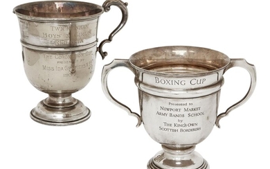 A large twin-handled silver trophy cup, Sheffield, c.1931, Walker & Hall, the body with presentation engraving for the Newport Market Army Bands School, 17cm high, together with a silver-plated example (one handle deficient), weighable weight...