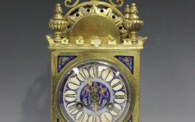 A late 19th century French brass and enamelled porcelain mounted mantel clock with eight day movemen