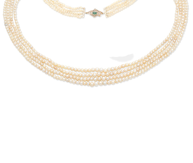 A natural pearl necklace with an emerald and diamond clasp