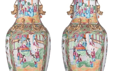 A pair of Chinese Canton vases, with fixed...