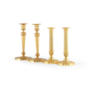 A pair of French early 19th century gilt bronze candlesticks