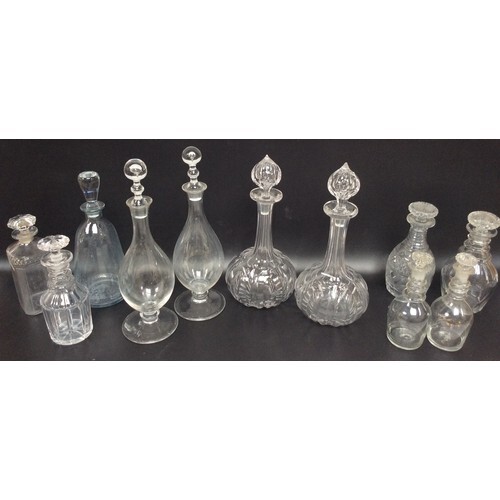 A pair of Victorian cut glass shaft-and-globe decanters with...