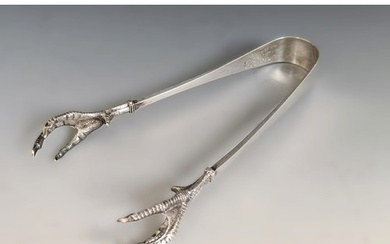 A pair of Victorian silver novelty ice tongs, in the form of...