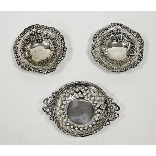 A pair of Victorian silver pierced circular bonbon dishes, e...