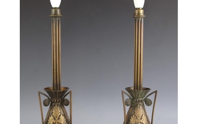 A pair of brass table lamp bases, 20th century, each with fl...