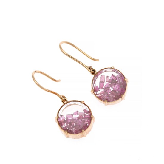 A pair of ruby ear pendants each set with numerous fancy-cut rubies, mounted in 18k gold. Diam. app. 14 mm. L. app. 3 cm. (2)