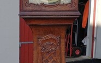 SOLD. A richly carved oakwood longcase clock. Denmark, 19th century. H. 207 cm. – Bruun...