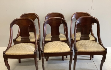 A set of six French Empire style mahogany dining chairs, wid...