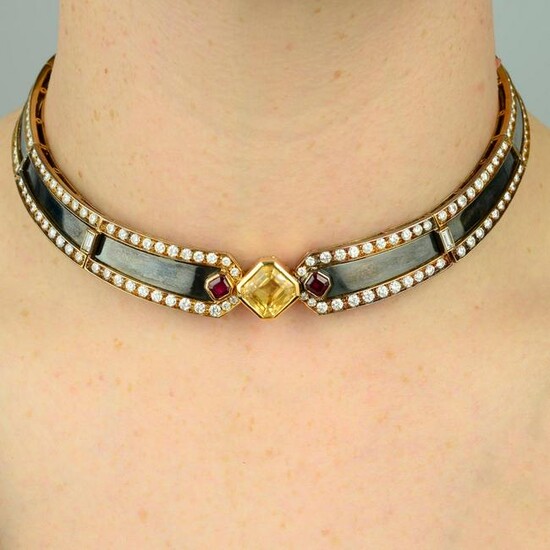 A yellow sapphire, ruby and diamond collar necklace.