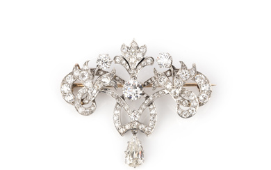 An Art Nouveau diamond scroll brooch