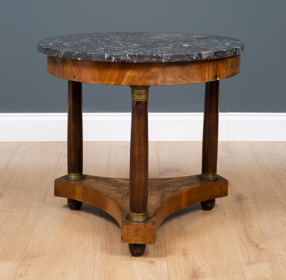 An empire style continental low marble-topped Gueridon