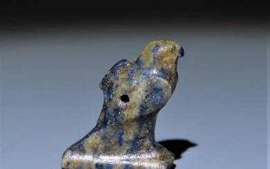 Ancient Egyptian lapislazuli Horus Falcon amulet.