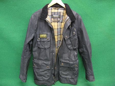 Barbour International motorcycle jacket in excellent condition, size L with two chest, two waist and inside pockets together...