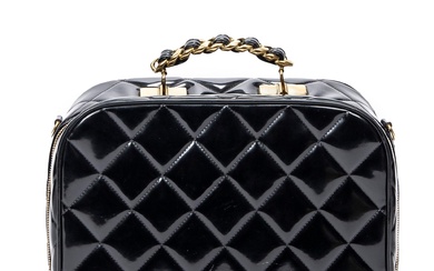 CHANEL, LARGE PATENT VANITY CHAIN BAG Please note all purchases will arrive in the Melbourne show room 10 days after purchase.