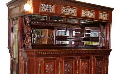 Canopy corner pub bar in carved mahogany with painted and...