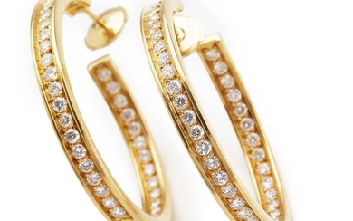 Cartier: A pair of diamond ear pendants “Creoles” each set with numerous brilliant-cut diamonds, mounted in 18k gold. Signed Cartier. Diam. app. 3.8 cm. (2)