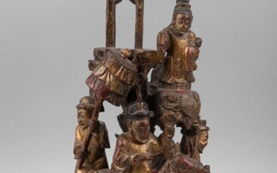 Chine, fin 19eme Sculpture en bois laqué rouge et or, divinité devant un autel.