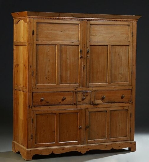 Continental Pine Cupboard, 19th c., the sloping crown