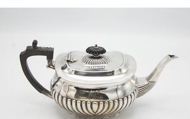 Early 20th Georgian style century silver half fluted teapot,...