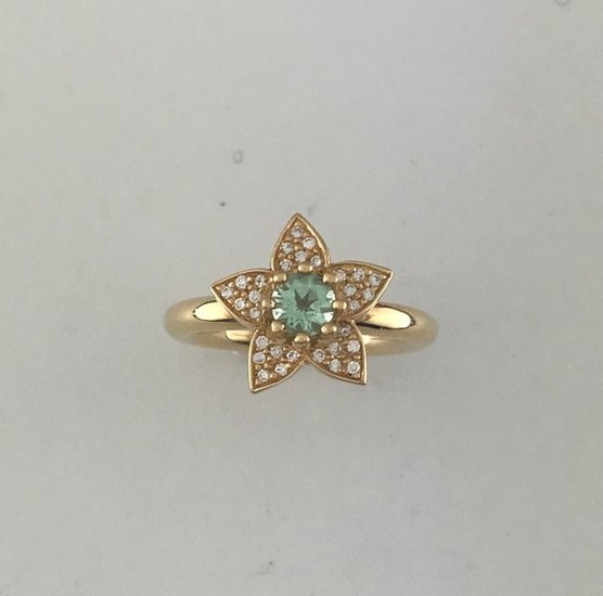 Flower ring in 750°/°° gold set with a...