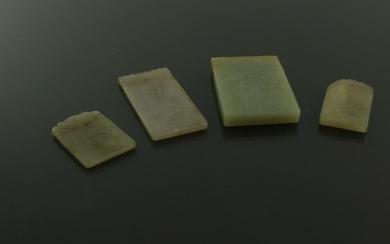 Four Chinese carved jade pendant plaques