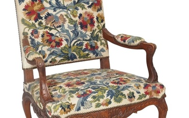 French Louis XIV Style Carved Walnut Fauteuil, 19th c., arched back, padded arms, shell carved apron