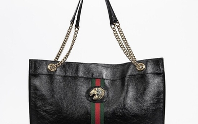 SOLD. Gucci: A "Large Rajah Tote" bag of black leather with gold tone hardware, two handles and one compartment with a magnetic closure. – Bruun Rasmussen Auctioneers of Fine Art