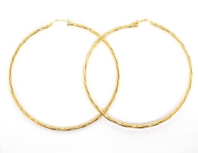 Large 9ct yellow gold hoop earrings with a fluted twist desi...