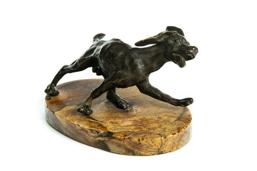 PATINATED BRONZE FIGURE OF A DOG IN MOTION
