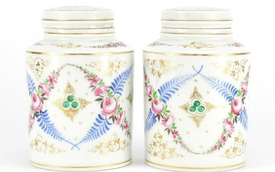 Pair of continental porcelain canisters with covers