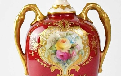 ROYAL WORCESTER; a twin-handled waisted vase with red ground and...