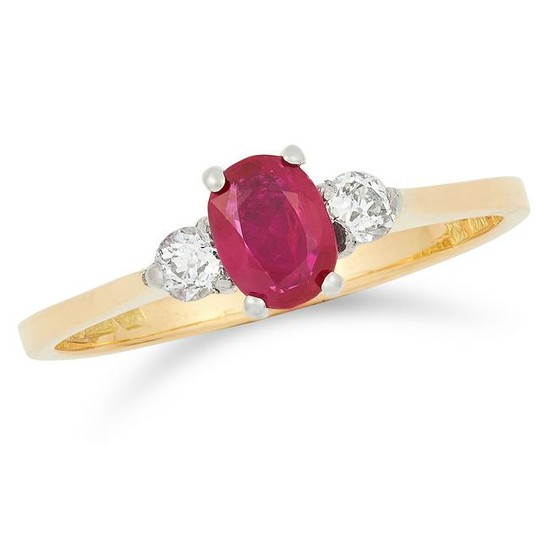 RUBY AND DIAMOND RING set with an oval cut ruby between