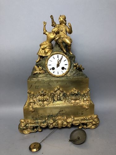 Romantic pendulum clock with two bronze figures, the...