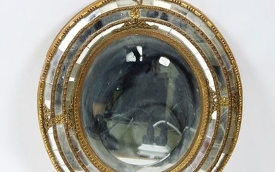 Small oval mirror, brass frame with pearl decoration...
