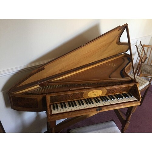 Spinet by Alan Whear A wing spinet in a walnut case with bur...