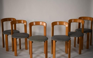 Suite of six laminated wood chairs with round seats. H: 78 cm; W: 49 cm; Seat diameter: 44 cm (stains, wear)